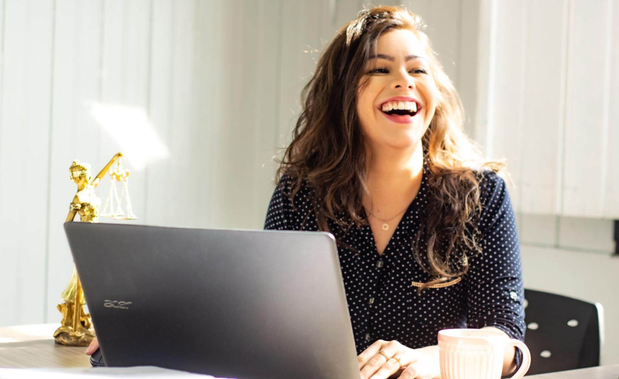 A writer smiling about her work